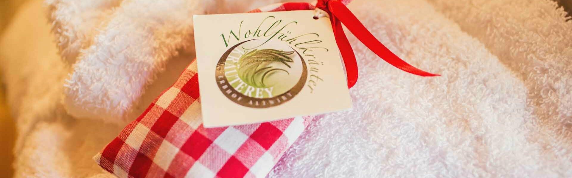 Bademantel mit Kräuterduftkissen